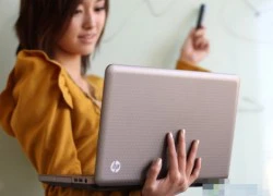 Thiếu nữ yêu kiều với laptop HP