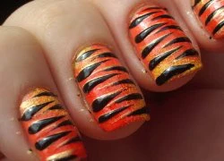 Vẽ nail con hổ tinh nghịch cho cô nàng cá tính