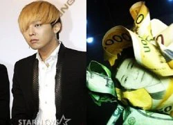 G-Dragon bị chỉ trích vì dùng tiền giấy làm hoa