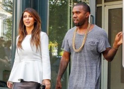 Kanye West đeo "xích" vàng to bự đi chơi với Kim siêu vòng ba