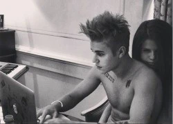 Justin Bieber đăng ảnh được Selena Gomez ôm