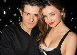 Vợ chồng Miranda Kerr - Orlando Bloom ôm nhau thắm thiết trước ống kính