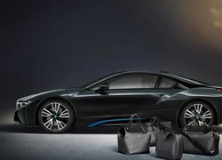 Đi xe BMW, xách túi Louis Vuitton