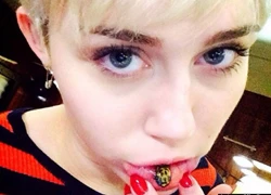 Miley Cyrus chơi ngông xăm hình trong môi