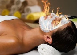 Cận cảnh đốt lửa massage mặt làm đẹp