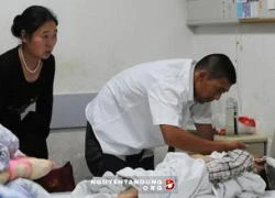 Trung Quốc: Mang chất nổ, bắt cóc giáo viên và 50 học sinh