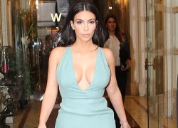 Kim Kardashian khoe ngực bốc lửa dưới trời mưa Paris