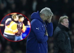 Fan đột nhập sân to tiếng với HLV Wenger