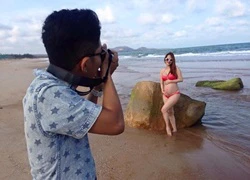 &#8220;Bà bầu&#8221; Khánh Thi mặc bikini đỏ làm mẫu cho Phan Hiển