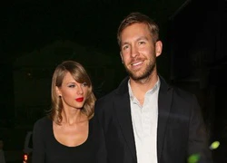 Taylor Swift diện váy ngắn quyến rũ, e ấp nắm tay Calvin Harris