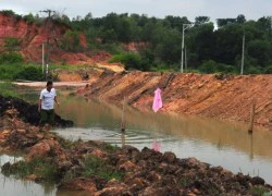 Điều tra vụ hai chị em ôm nhau chết đuối dưới hố công trình