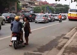 "Nữ quái" mang kim tiêm ra đường xin đểu