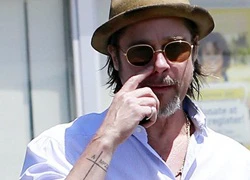 Brad Pitt xăm hình tặng Angelina Jolie và các con