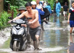 Vỡ đập chứa xỉ than, hàng nghìn khối bùn tràn vào nhà dân