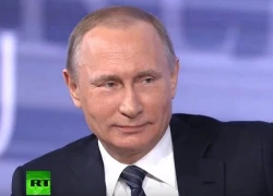 Putin được nữ phóng viên khen dáng chuẩn