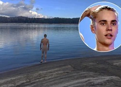 Justin Bieber đăng hình nude bên hồ nước, nhấn like ảnh của Selena