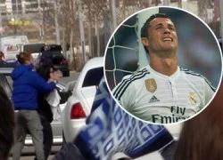 Ronaldo lao xe lên vỉa hè trốn fan cuồng