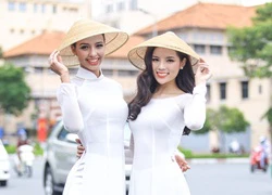 Á hậu Hoàn vũ 2015 diện áo dài trắng dạo phố Sài thành