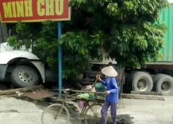 Ngủ gật, lái xe container lao vào nhà dân