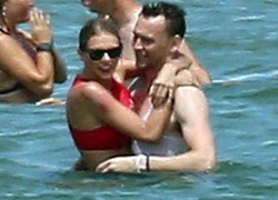 Taylor Swift và Tom Hiddleston ôm nhau tắm biển mặc nghi vấn "diễn kịch"