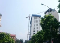 Dùng máy cắt dây kim cương phá dầm, cột nhà 8B Lê Trực