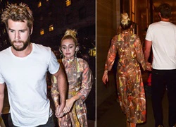 Miley Cyrus và bạn trai tay trong tay về khách sạn