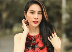 Bà xã Công Vinh rực rỡ sắc hồng đón xuân