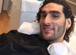 'Cây sào' Fellaini cắt bỏ mái tóc xù