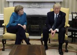 Phía sau hành xử lạ lùng của Donald Trump với bà Merkel