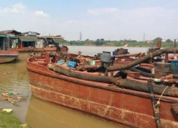 Bắt nhóm đối tượng khống chế chủ tàu cát, thu "luật ngầm"