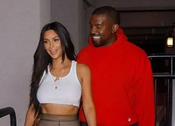 Kanye West tình tứ ôm eo Kim đi xem phim