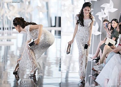 Hành động lên sàn catwalk nhặt giày Minh Tú đánh rơi của Hương Giang khiến dân mạng "nức lòng"