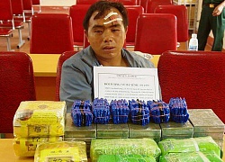 Bắt thầy giáo mang súng K54, cùng 20 bánh heroin xuống núi