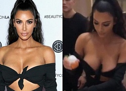 Kim Kardashian diện áo trễ nải suýt hớ hênh cả vòng 1 khủng khi cúi xuống