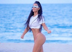 Kim Kardashian diện bikini siêu nhỏ khoe vòng ba trong buổi chụp hình