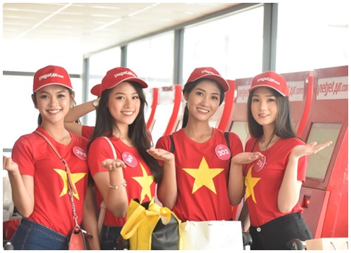 Hoa hậu Việt Nam khoe sắc áo cờ đỏ sao vàng trên tàu bay Vietjet