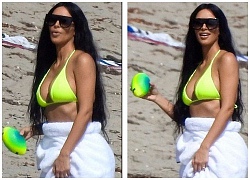 Chị em nhà Kim Kardashian rực rỡ xanh chuối ở biển Malibu