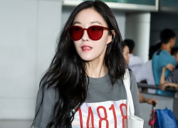 Hyomin (T-ara) nổi bật với trang phục tông đỏ tại sân bay Tân Sơn Nhất