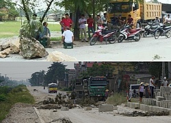 Người dân mang đá, gỗ ra chặn đường vì ô nhiễm