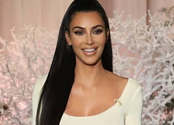 Từng bị cướp dí súng vào đầu vì thói khoe của, Kim Kardashian vẫn vô tư chưng diện hàm răng đính kim cương