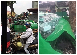 Vụ tai nạn "nóng" trên phố Sài Gòn: Taxi lao lên vỉa hè, đâm vào gốc cây, đầu xe biến dạng