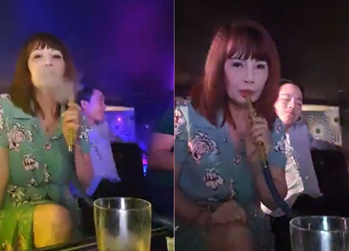 Sau "phốt" mang bầu giả, cô dâu 62 tuổi thản nhiên cùng chồng trẻ hút shisha trong quán bar