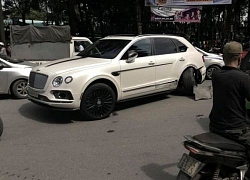 Taxi 'nhọ nhất năm' tông gãy bánh siêu xe Bentley hàng chục tỷ