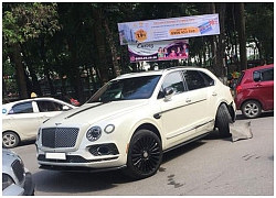 Bentley Bentayga độ Mansory "chấn thương" sau pha đụng chạm với taxi xanh lá