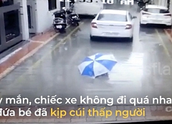 Ô tô cán qua người, bé trai thoát chết thần kỳ