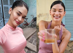 Hoa hậu Hoàn vũ Pia Wurtzbach mặc áo dài, uống cà phê ở Hội An