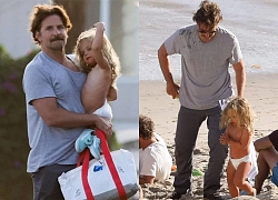 Bradley Cooper một mình bế con đi tắm biển