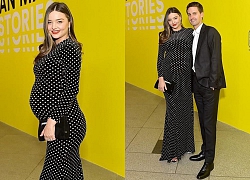 Miranda Kerr bế bụng bầu đến ủng hộ chồng tỷ phú