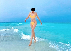 Trang Trần đi du lịch mà khuân cả bộ sưu tập đồ bơi để chụp ảnh bikini siêu sexy