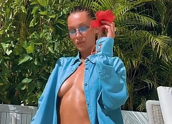 Bella Hadid phanh áo lộ vòng một 'thả rông', ngồi yên cũng vô cùng sexy